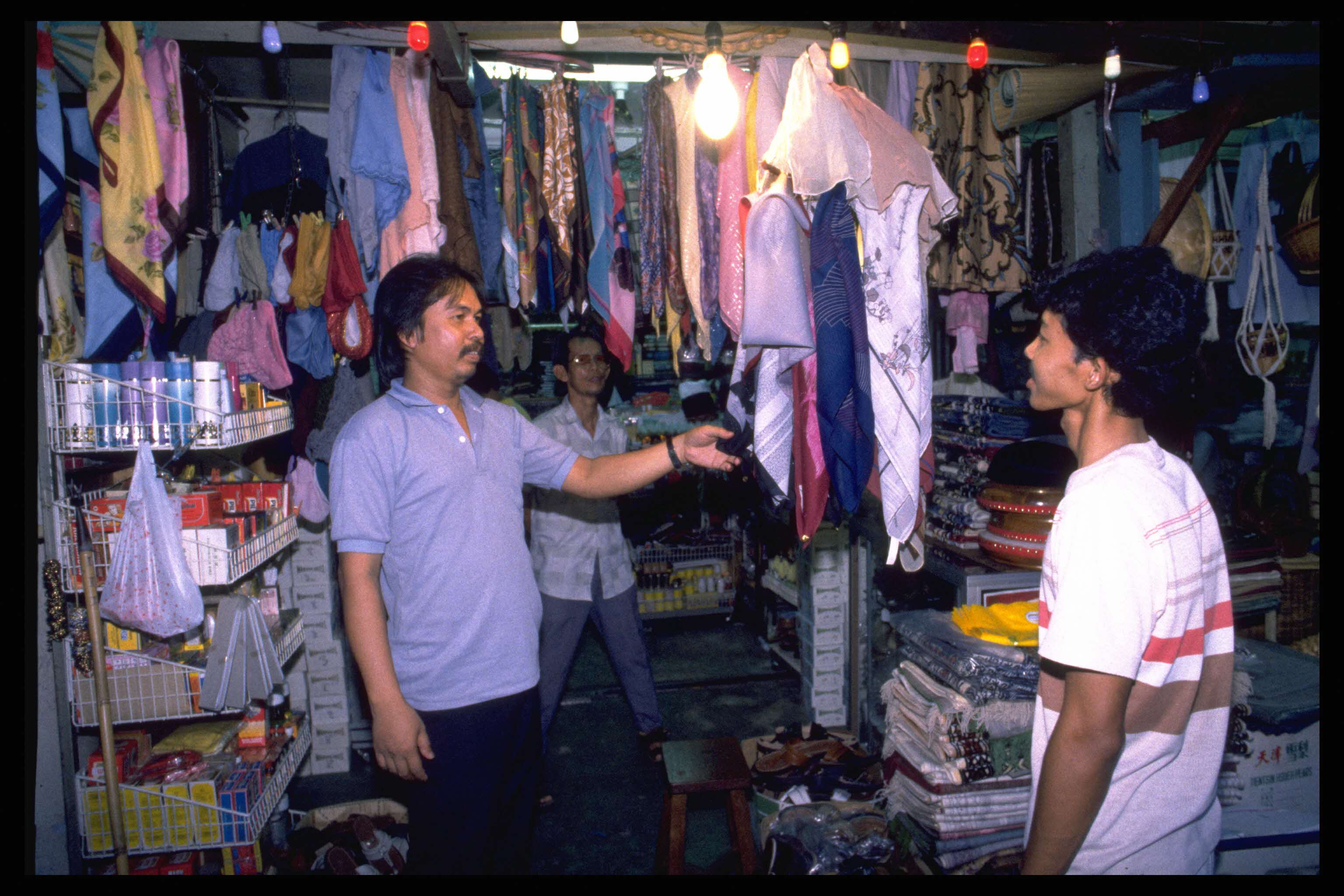 Shopping at Jalan Sultan Bussorah Street, 1988.